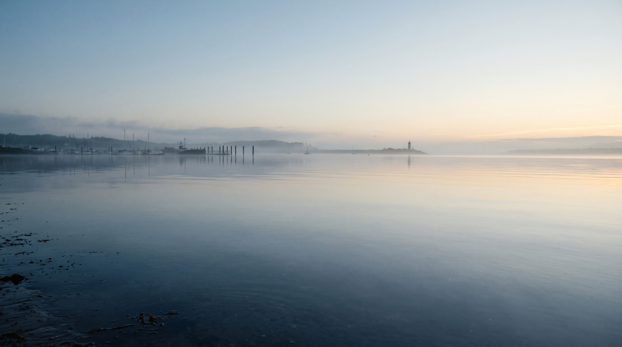Calm harbor at first light along the Orange County coast